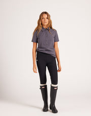 Women's high-rise knee grip black equestrian breeches for horse riding, designed with performance stretch fabric, supportive waistband, flattering seam lines, and functional pockets. Versatile riding pants for schooling, casual rides, barn days, and everyday equestrian wear.