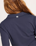 Milrey Callie long sleeve riding blouse in navy — four-way stretch performance fabric for riders.