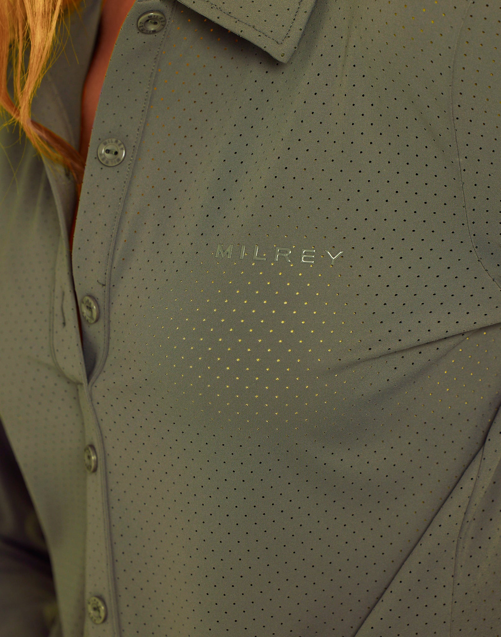 Milrey Callie long sleeve riding blouse in olive green — detail of discreet perforation and buttons.
